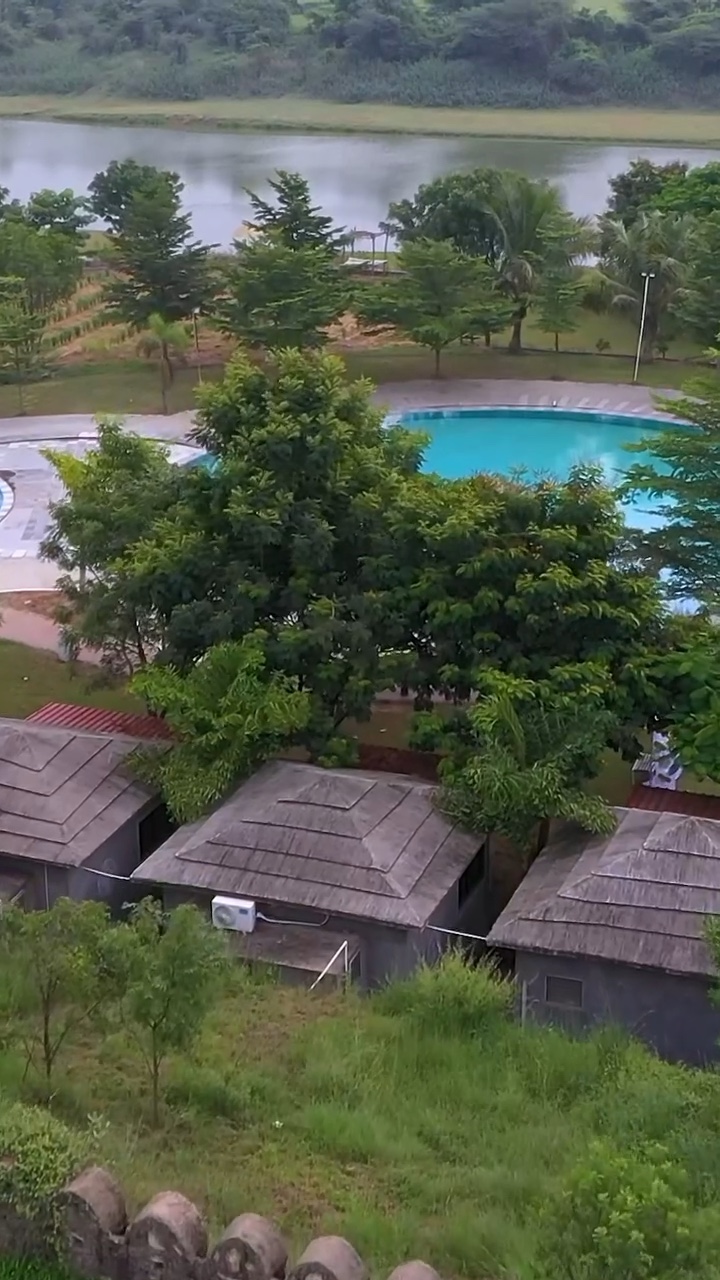 Cottages among the trees, from above